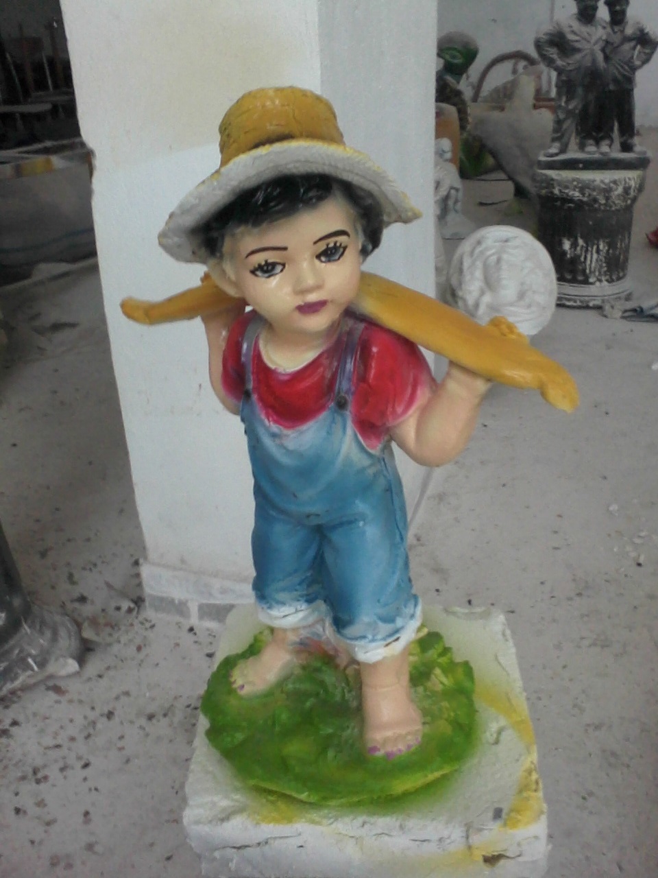 oduncu çocuk; alçı boyalı en.20 boy.33 yüks.47 ağr.1