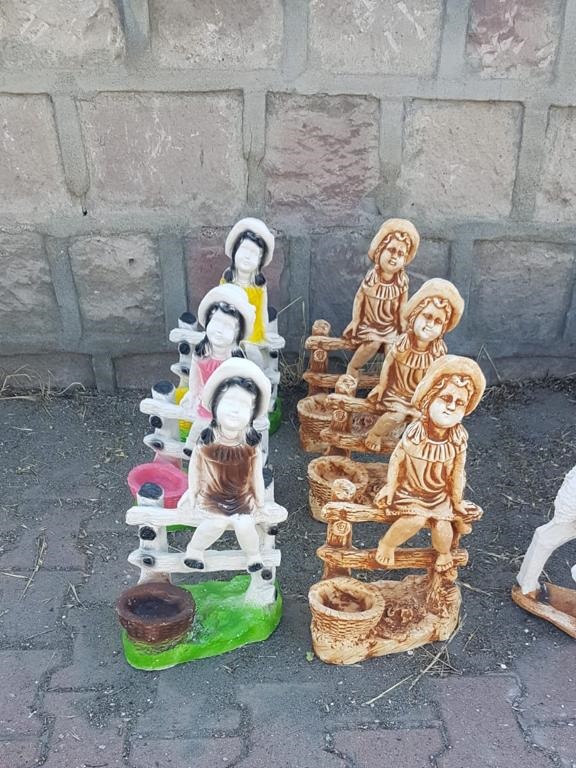 salıncak kız: alçı en.20 boy.30 yüks.50 ağr.2
