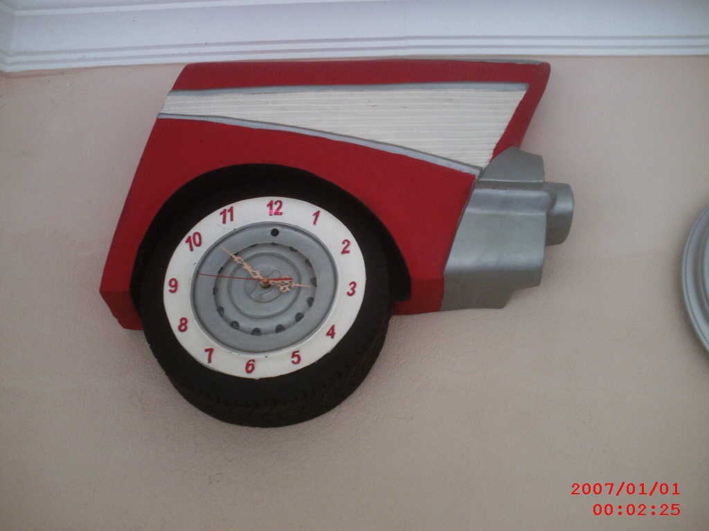 arabalı saat; promit en.15 boy.60 yüks.60 ağr.10